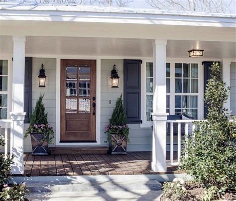 light grey house with dark grey shutters